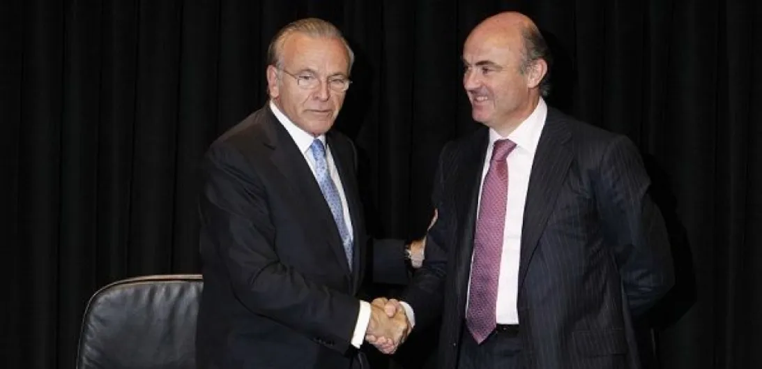 Pulso Guindos-Fainé. Por ahora, el Gobierno mantiene la incompatibilidad entre bancos y cajas